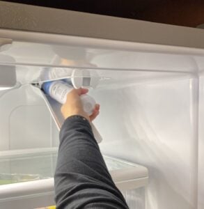 Changing a refrigerator water filter