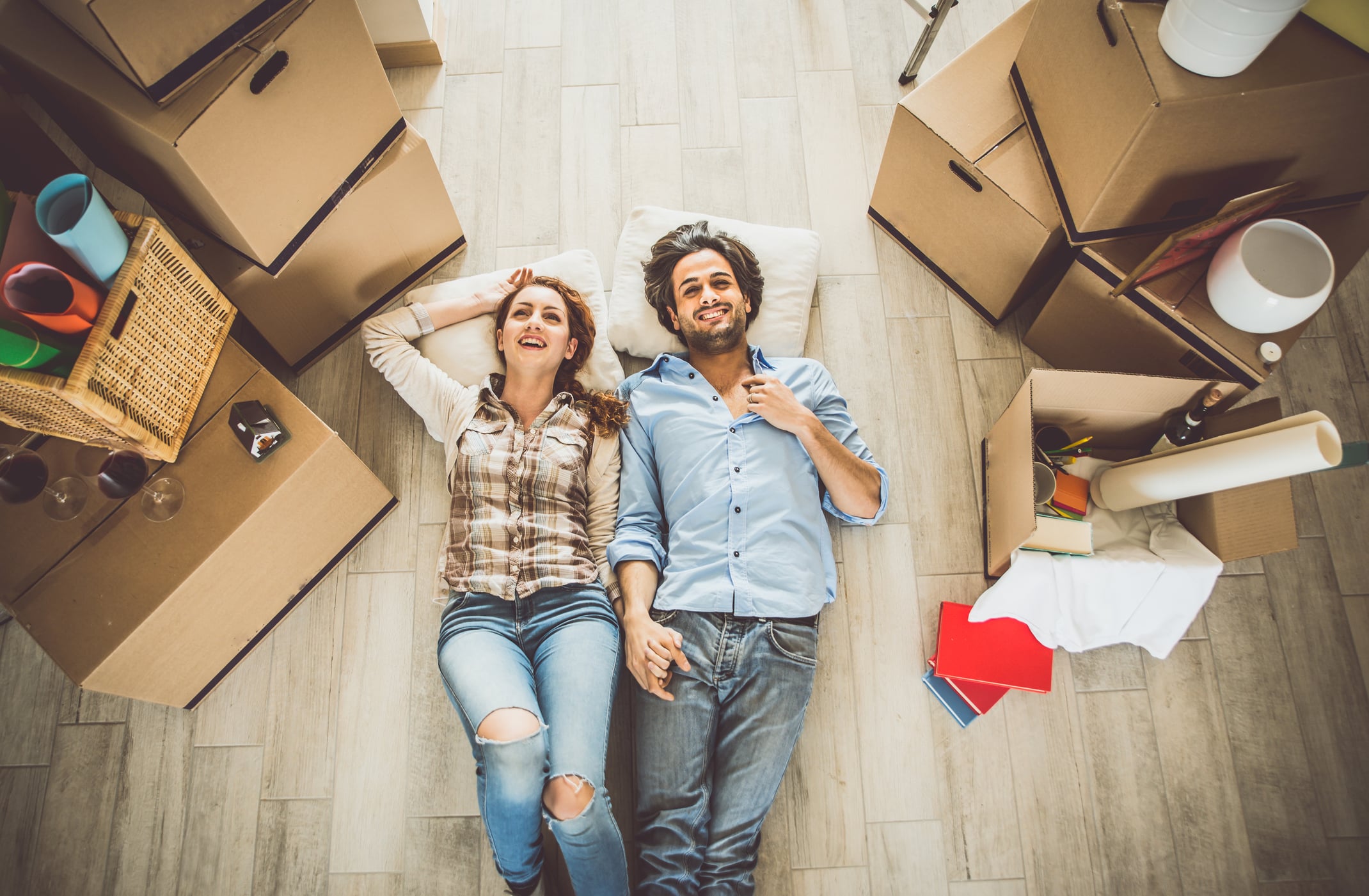 Young couple moving in into new place