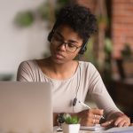 woman researching on computer