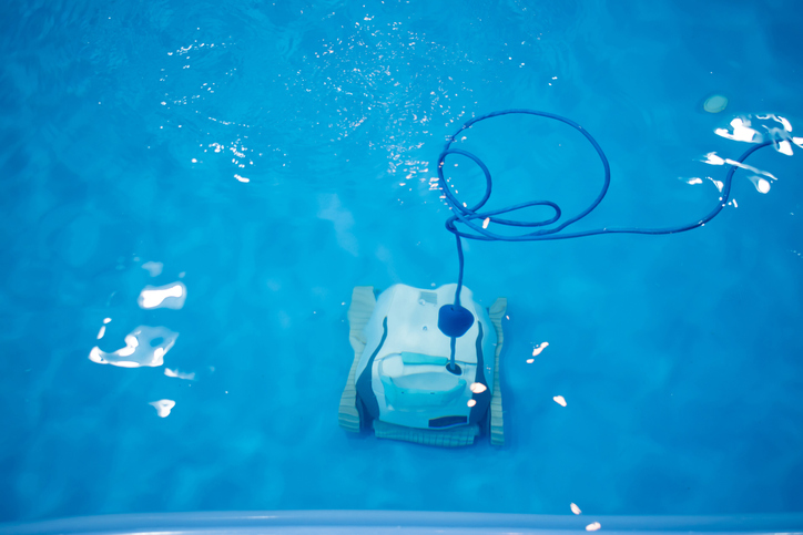 The robot is cleaning the pool. Maintenance pool concept