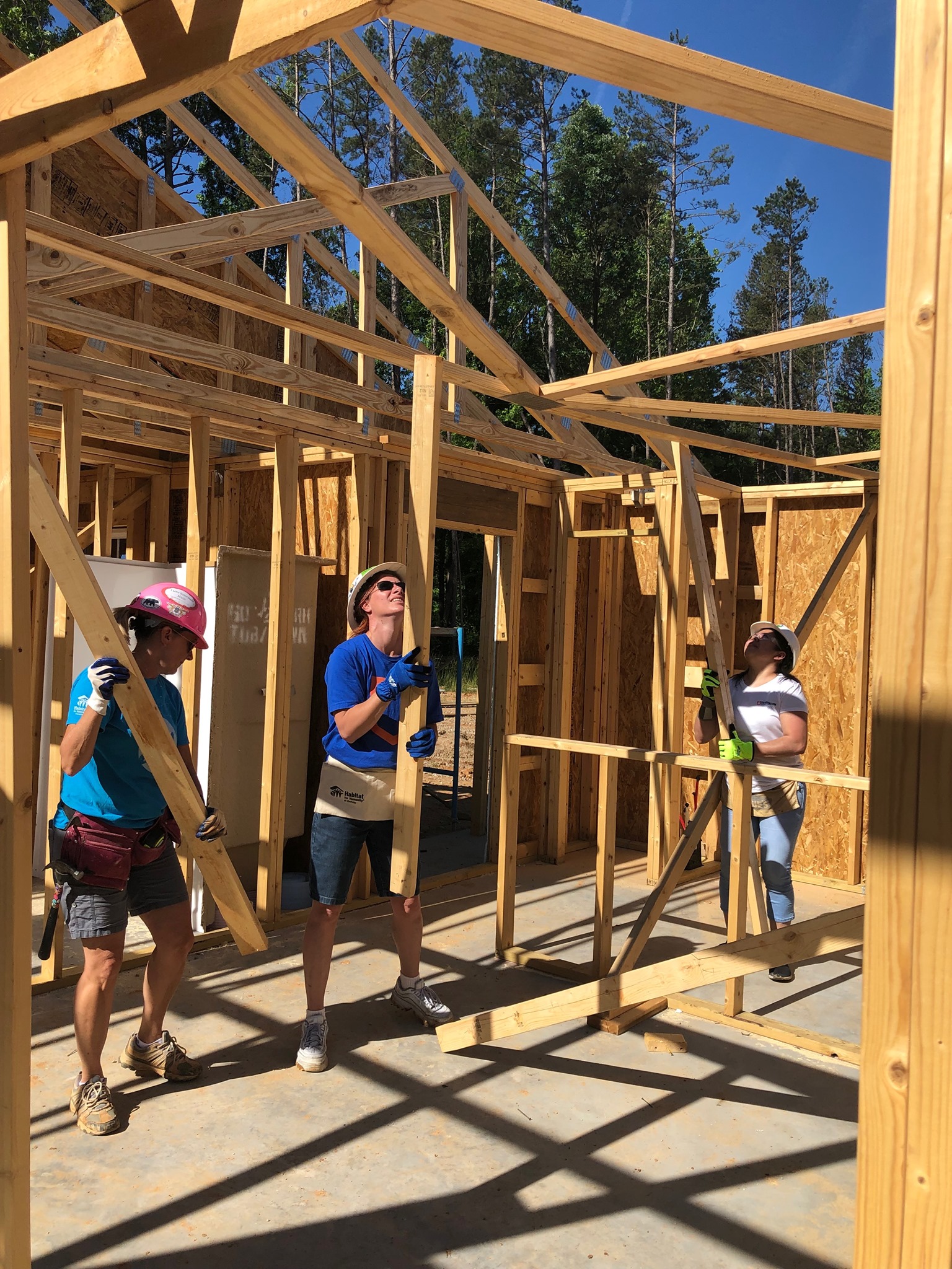 Filters Fast employees working on house frame for Habitat