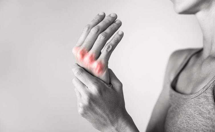 Woman suffering from Arthritis inflammation and joint health. Womens health and wellness